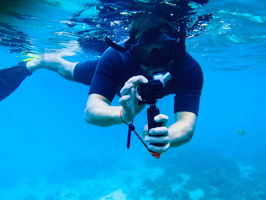 male snorkeler using action camera underwater 2021 09 04 00 09 08 utc